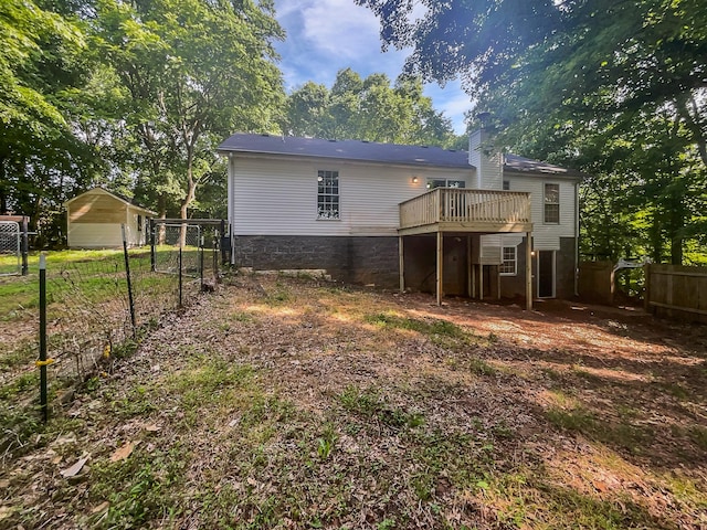 108 Nancy Ave, Pleasant View, TN 37146 - back of house featuring a wooden deck and a chimney