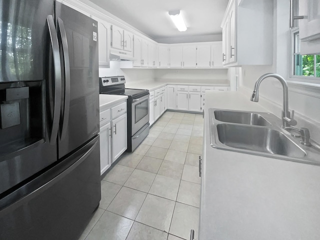 108 Nancy Ave, Pleasant View, TN 37146 - kitchen featuring stainless steel appliances, under cabinet range hood, a sink, light tile patterned floors, and white cabinets