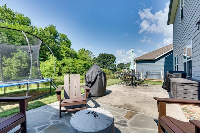 6022 Somerhaven Trl, Hixson, TN 37343 - view of patio / terrace with a trampoline and outdoor dining area
