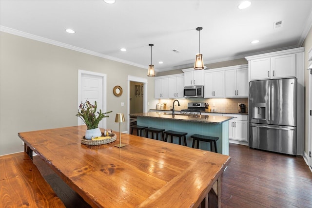 6022 Somerhaven Trl, Hixson, TN 37343 - dining room featuring crown molding, dark wood finished floors, and recessed lighting