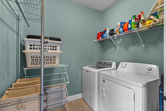 6022 Somerhaven Trl, Hixson, TN 37343 - washroom featuring separate washer and dryer, tile patterned flooring, and baseboards