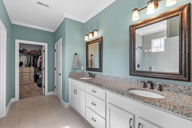 6022 Somerhaven Trl, Hixson, TN 37343 - full bathroom with tiled shower, double vanity, a walk in closet, ornamental molding, and baseboards
