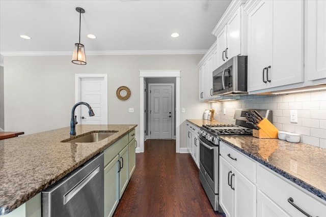 6022 Somerhaven Trl, Hixson, TN 37343 - kitchen featuring appliances with stainless steel finishes, a sink, ornamental molding, backsplash, and white cabinets