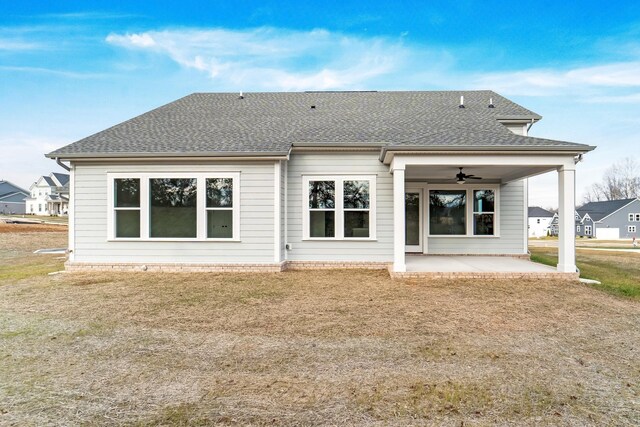 7321 Katherine Ct, Fairview, TN 37062 - rear view of house featuring a ceiling fan, a patio, roof with shingles, and a lawn
