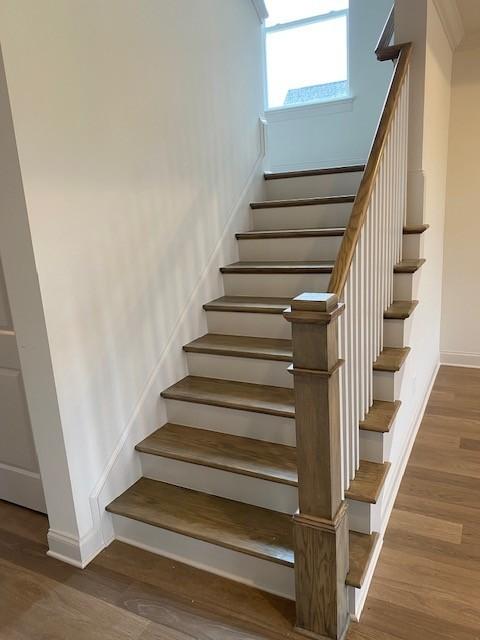7317 Katherine Ct, Fairview, TN 37062 - stairs with wood finished floors and baseboards