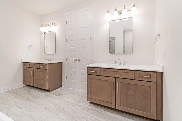 7317 Katherine Ct, Fairview, TN 37062 - full bathroom featuring two vanities and baseboards