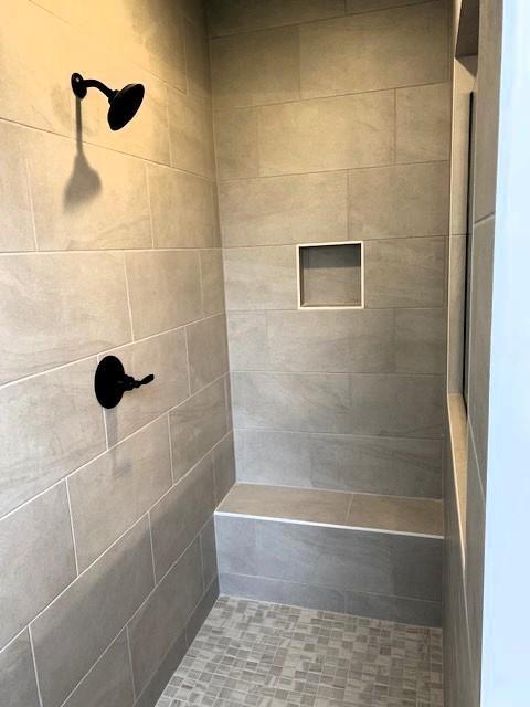 7317 Katherine Ct, Fairview, TN 37062 - bathroom featuring a tile shower