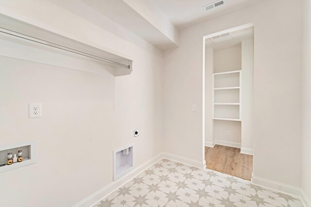 7317 Katherine Ct, Fairview, TN 37062 - washroom featuring light floors, hookup for a washing machine, electric dryer hookup, and baseboards