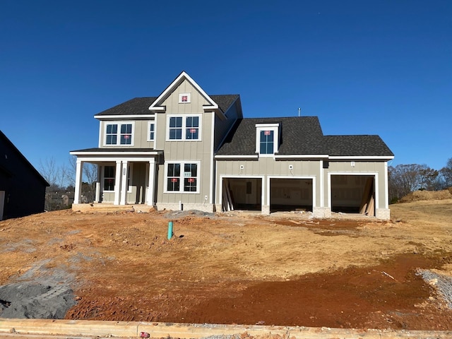 7317 Katherine Ct, Fairview, TN 37062 - view of front of home featuring board and batten siding, roof with shingles, and a garage