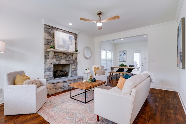 6233 Del Sol Dr, Whites Creek, TN 37189 - living room with wood finished floors, ornamental molding, a ceiling fan, a stone fireplace, and baseboards