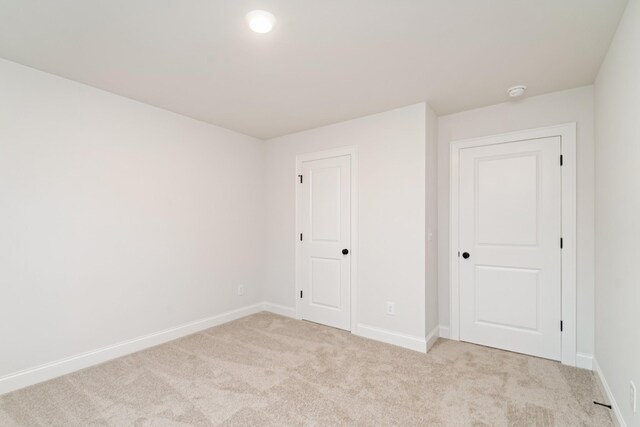 7406 Black Fox Dr, Fairview, TN 37062 - unfurnished bedroom with light colored carpet and baseboards