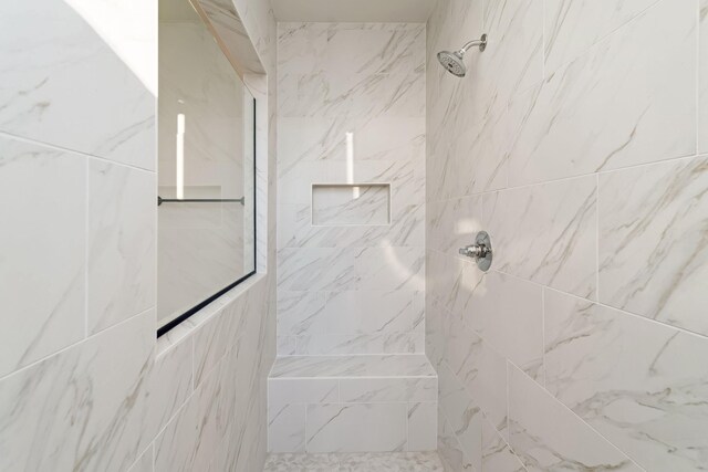 7406 Black Fox Dr, Fairview, TN 37062 - full bathroom with a marble finish shower