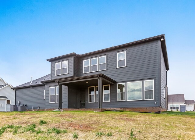 7406 Black Fox Dr, Fairview, TN 37062 - view of front of home featuring central AC and a front yard