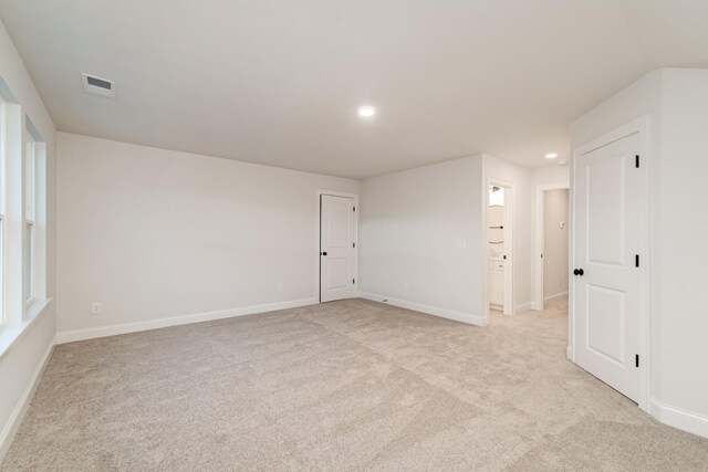 7406 Black Fox Dr, Fairview, TN 37062 - unfurnished room with light colored carpet, recessed lighting, and baseboards