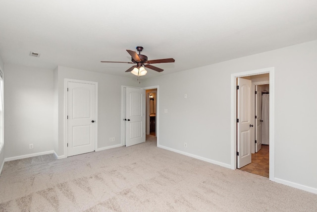 552 Magnolia Dr, Clarksville, TN 37042 - unfurnished bedroom featuring carpet flooring, baseboards, and a ceiling fan