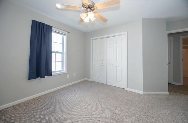 1905 Bugle Ct, Spring Hill, TN 37174 - unfurnished bedroom featuring carpet, a closet, and a ceiling fan