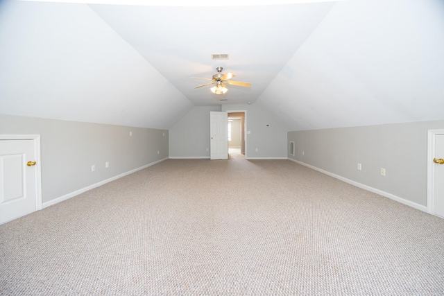 1905 Bugle Ct, Spring Hill, TN 37174 - additional living space with light colored carpet, vaulted ceiling, and a ceiling fan