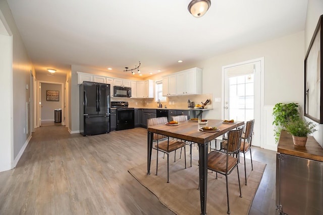 1905 Bugle Ct, Spring Hill, TN 37174 - dining area featuring healthy amount of natural light, light wood finished floors, and recessed lighting