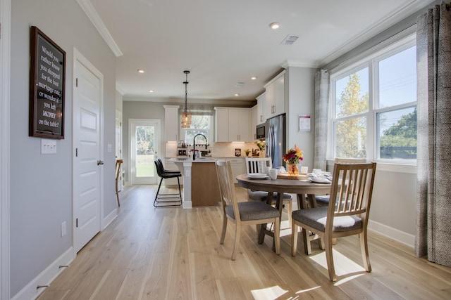 5220 Gladecress Ln NE, Hermitage, TN 37076 - dining area with ornamental molding, light wood finished floors, baseboards, and recessed lighting
