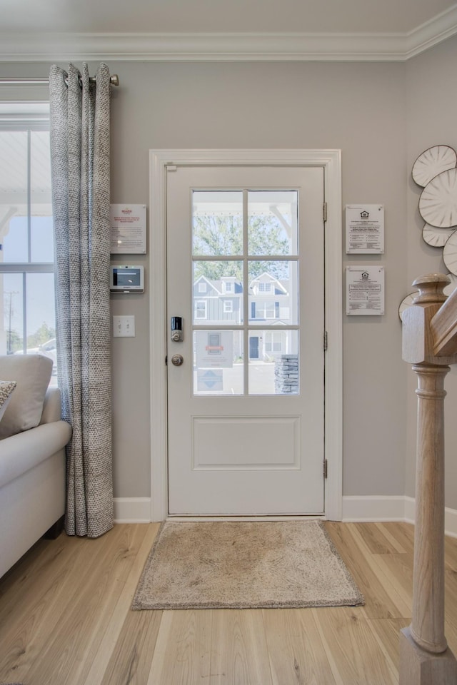 5220 Gladecress Ln NE, Hermitage, TN 37076 - doorway with crown molding, light wood-type flooring, and baseboards