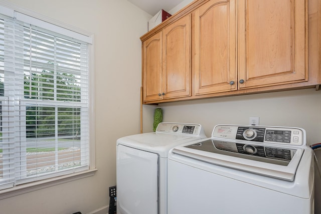 1245 Ben Hill Blvd, Nolensville, TN 37135 - laundry room with cabinet space, washing machine and dryer, plenty of natural light, and baseboards
