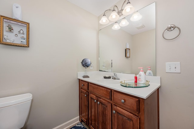 1245 Ben Hill Blvd, Nolensville, TN 37135 - bathroom with toilet, vanity, and baseboards