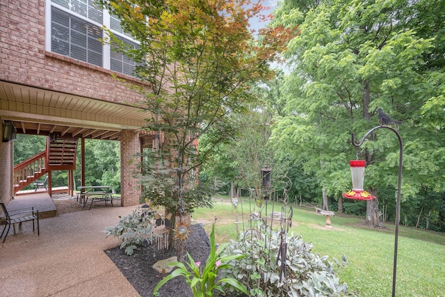 1245 Ben Hill Blvd, Nolensville, TN 37135 - view of green lawn featuring stairway and a patio