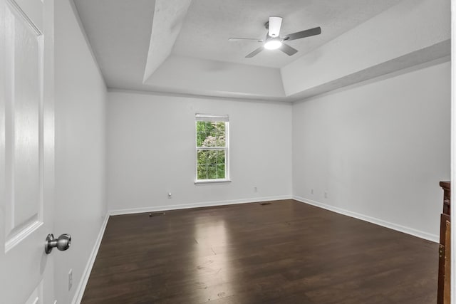 929 Chaparral Dr, Lebanon, TN 37087 - unfurnished room with a tray ceiling, ceiling fan, dark wood-style floors, and baseboards
