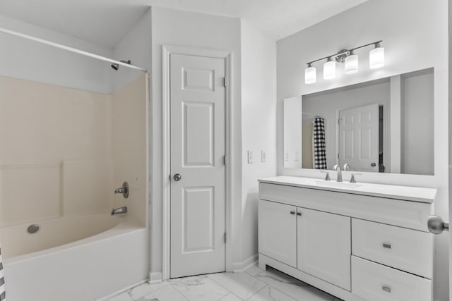 929 Chaparral Dr, Lebanon, TN 37087 - full bathroom featuring marble look tiles, vanity, shower / bath combo, and baseboards