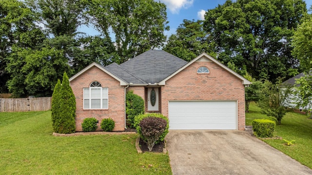929 Chaparral Dr, Lebanon, TN 37087 - single story home featuring concrete driveway, brick siding, a garage, and roof with shingles