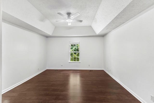 929 Chaparral Dr, Lebanon, TN 37087 - unfurnished room with ceiling fan, a raised ceiling, wood finished floors, baseboards, and a textured ceiling