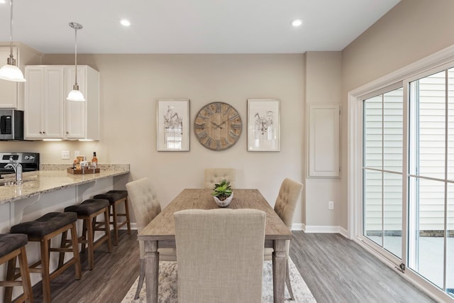 105 Primrose Ln, Gallatin, TN 37066 - dining space featuring dark wood-type flooring, recessed lighting, and baseboards