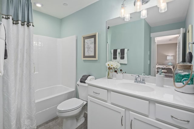 7890 Lampley Rd, Primm Springs, TN 38476 - bathroom featuring toilet, vanity, shower / bath combo with shower curtain, tile patterned floors, and ensuite bathroom