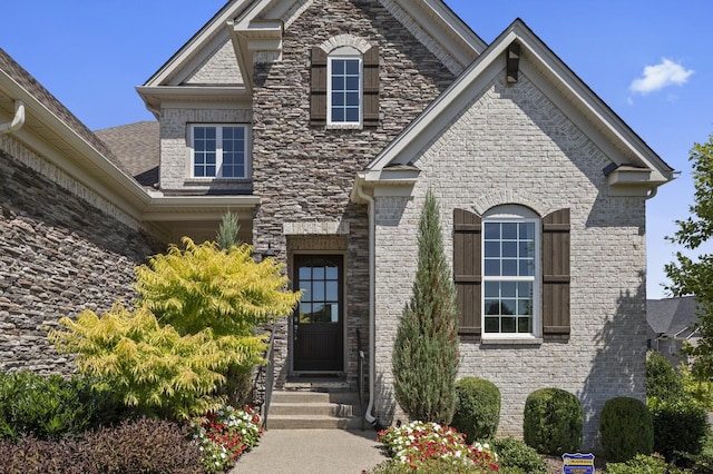 7890 Lampley Rd, Primm Springs, TN 38476 - view of front of home featuring brick siding and stone siding