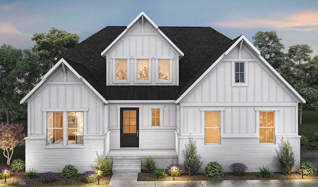 7890 Lampley Rd, Primm Springs, TN 38476 - modern farmhouse style home featuring board and batten siding, a shingled roof, brick siding, and metal roof