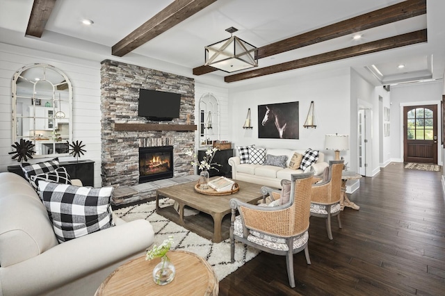 7890 Lampley Rd, Primm Springs, TN 38476 - living area featuring hardwood / wood-style flooring, beamed ceiling, a stone fireplace, recessed lighting, and baseboards