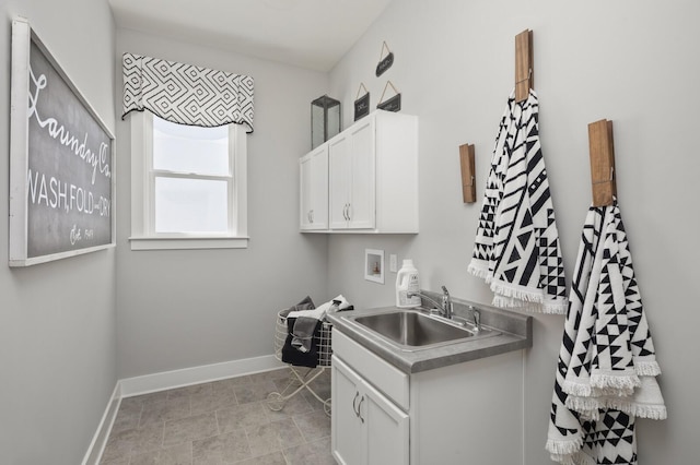 7890 Lampley Rd, Primm Springs, TN 38476 - washroom featuring hookup for a washing machine, baseboards, and cabinet space