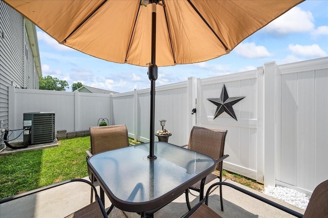 2183 Nectar Ln, Columbia, TN 38401 - fenced backyard featuring central AC, outdoor dining area, and a patio
