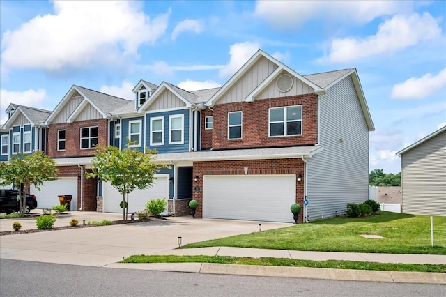 2183 Nectar Ln, Columbia, TN 38401 - view of front facade featuring board and batten siding, an attached garage, brick siding, and concrete driveway