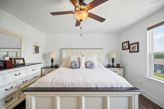2183 Nectar Ln, Columbia, TN 38401 - bedroom with dark wood-style flooring, multiple windows, a ceiling fan, and baseboards