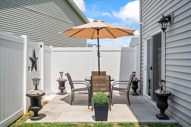2183 Nectar Ln, Columbia, TN 38401 - fenced backyard with outdoor dining space and a patio