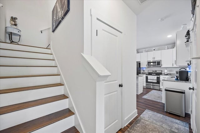 2183 Nectar Ln, Columbia, TN 38401 - stairs with wood finished floors and recessed lighting