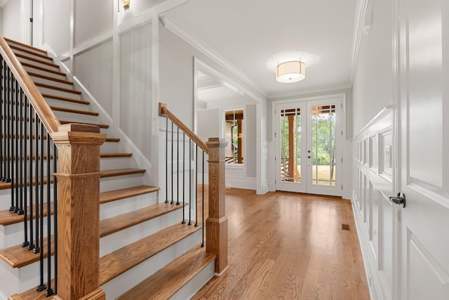 333 Burris Rd, Mount Juliet, TN 37122 - foyer with ornamental molding, light wood-type flooring, stairway, french doors, and a decorative wall