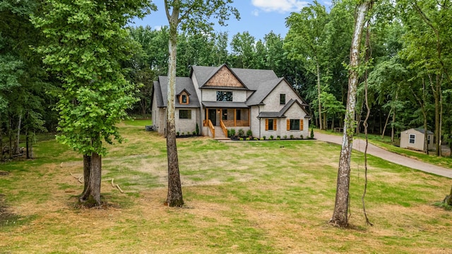 333 Burris Rd, Mount Juliet, TN 37122 - view of front facade with a front yard, driveway, and view of scattered trees