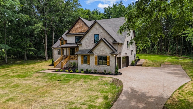 333 Burris Rd, Mount Juliet, TN 37122 - view of front of home with driveway, an attached garage, a front lawn, brick siding, and roof with shingles