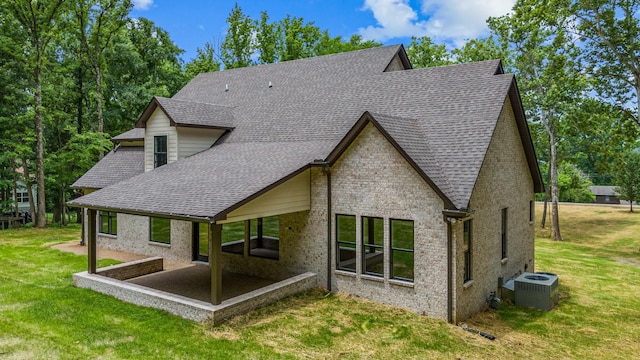 333 Burris Rd, Mount Juliet, TN 37122 - rear view of house with roof with shingles, central AC, a patio, and a yard