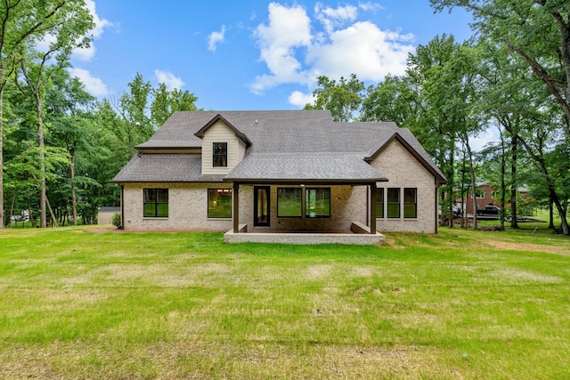 333 Burris Rd, Mount Juliet, TN 37122 - rear view of property with brick siding, a lawn, a shingled roof, and a patio