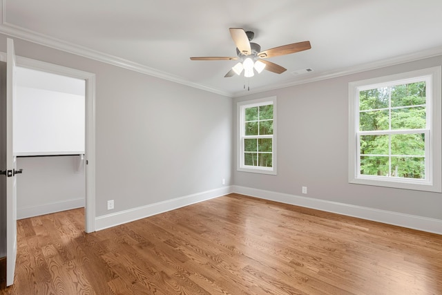 333 Burris Rd, Mount Juliet, TN 37122 - unfurnished room with light wood finished floors, baseboards, crown molding, and a ceiling fan