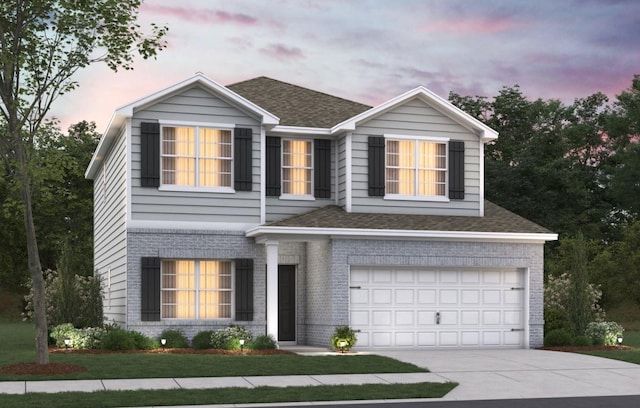 2011M Strong St, Columbia, TN 38401 - traditional-style house with a garage, driveway, roof with shingles, and brick siding