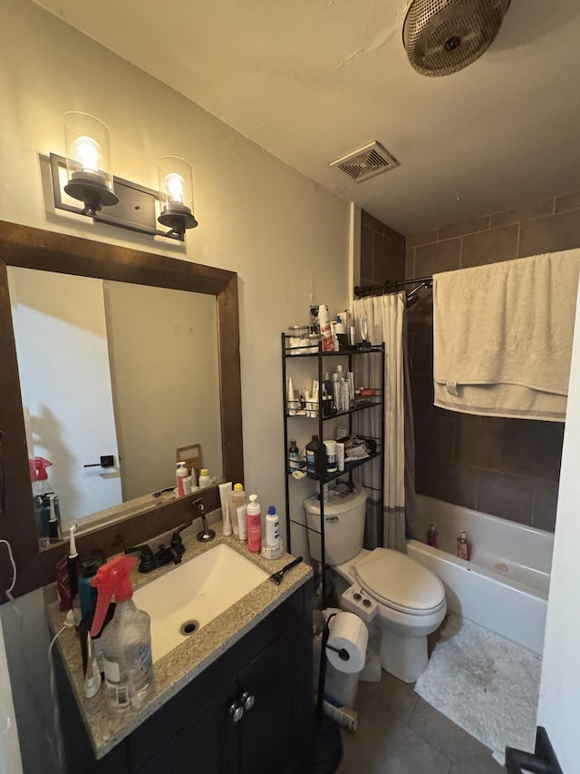2408 Woodale Ln, Nashville, TN 37207 - bathroom with vanity, tile patterned flooring, toilet, and shower / bathtub combination with curtain